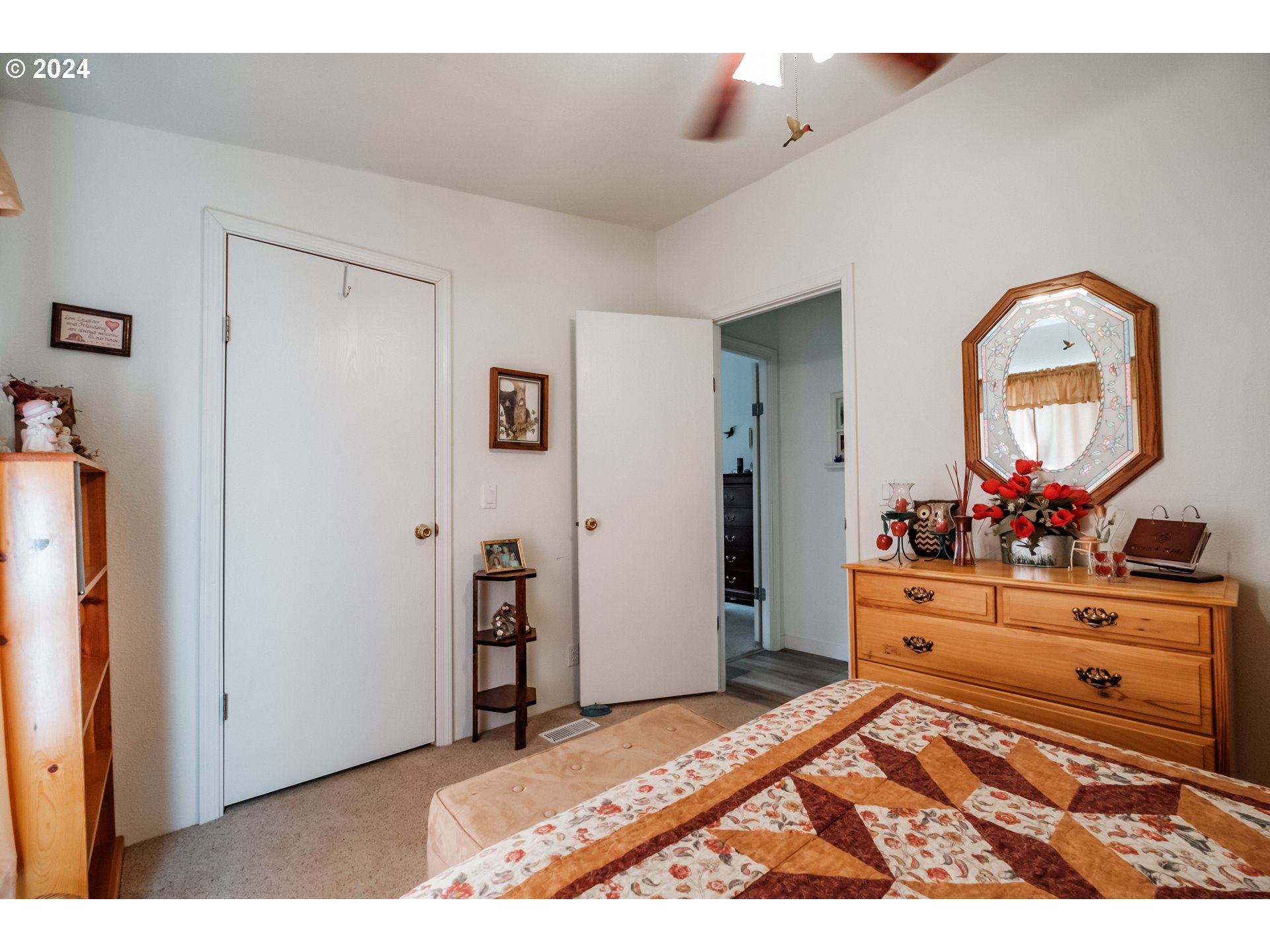 8560 Southeast Wallace Road Dayton, OR 97114 - Photo 29 of 48 a bed room with a bed and a dresser