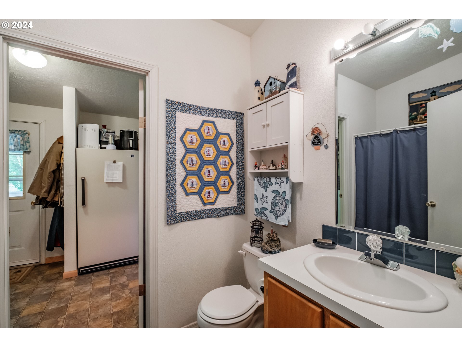 8560 Southeast Wallace Road Dayton, OR 97114 - Photo 31 of 48 a bathroom with a sink toilet and shower