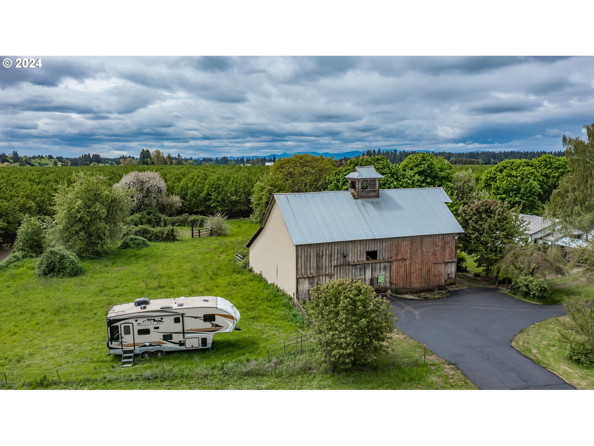 8560 Southeast Wallace Road Dayton, OR 97114 - Photo 6 of 48 a aerial view of a house with a yard