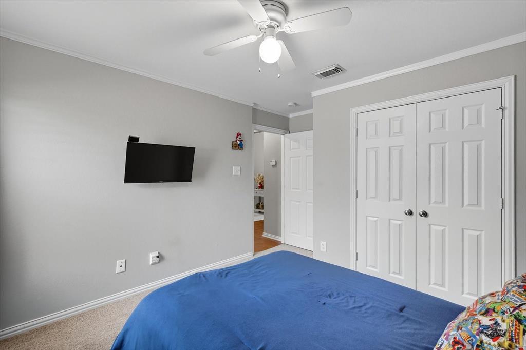 100 Turtle Dove Krum, TX 76249 - Photo 12 of 40 a view of empty room with wooden floor and fan