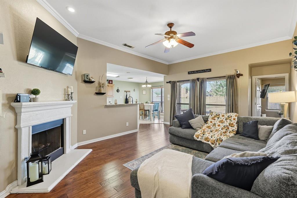 100 Turtle Dove Krum, TX 76249 - Photo 13 of 40 a living room with furniture and a flat screen tv