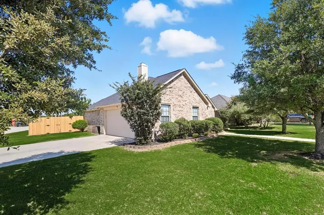 a view of a backyard with garden