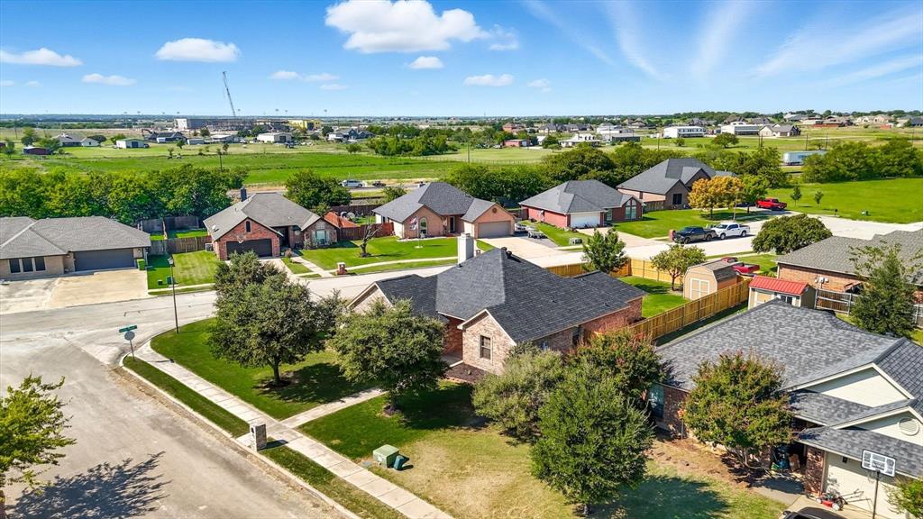 100 Turtle Dove Krum, TX 76249 - Photo 35 of 40 an aerial view of a house with yard swimming pool and outdoor seating