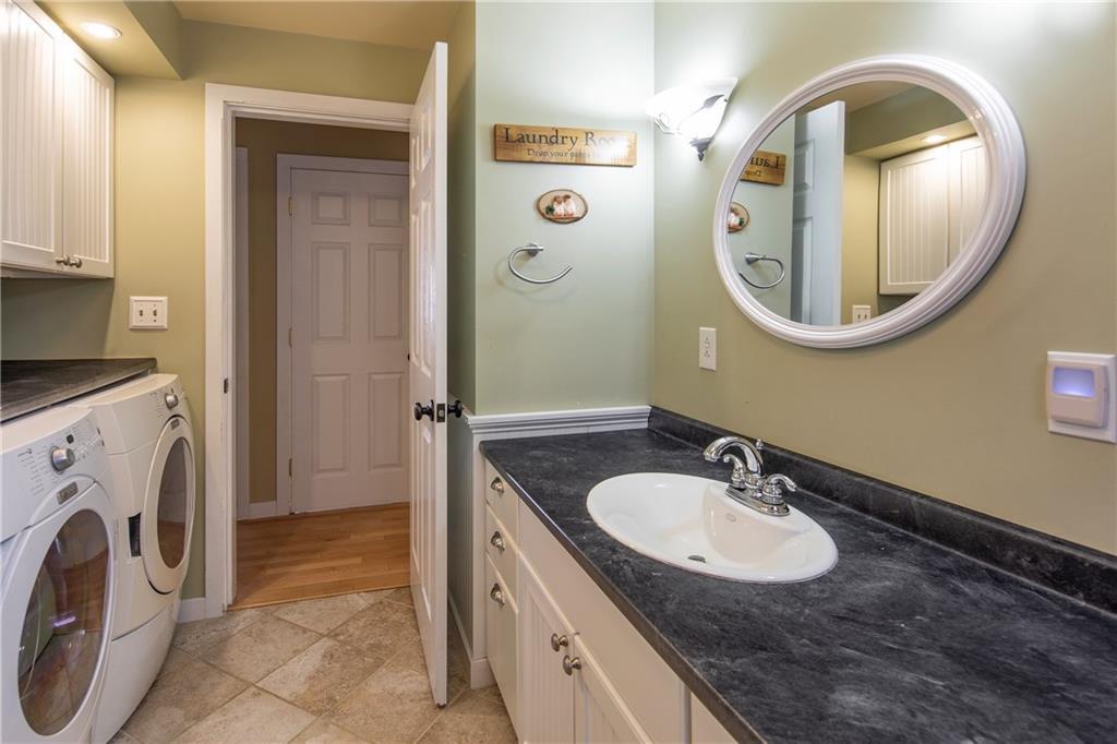50 Fernald Road Freeport, ME 04032 - Photo 13 of 28 First floor bath and laundry