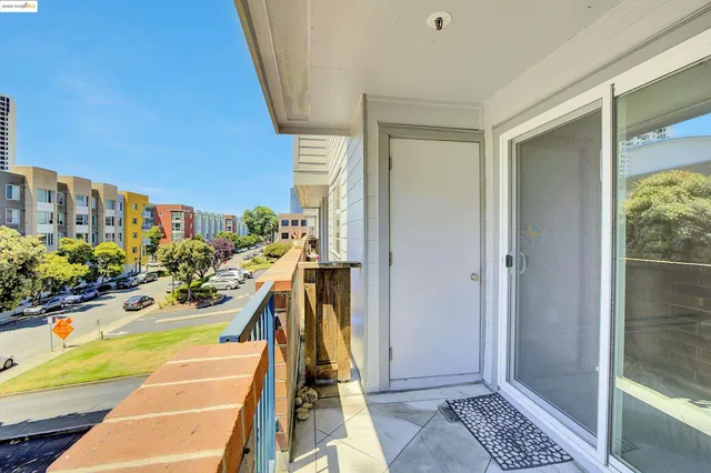 a view of a brick building with swimming pool