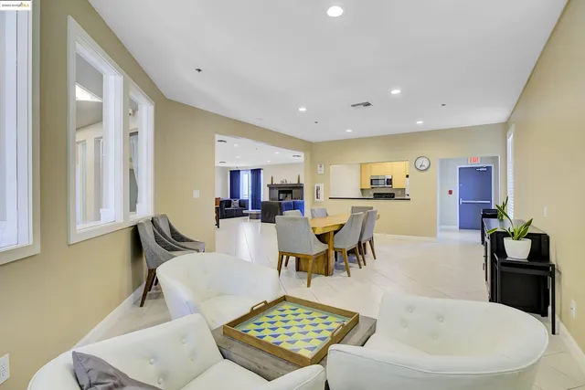a bedroom with bed and wooden floor