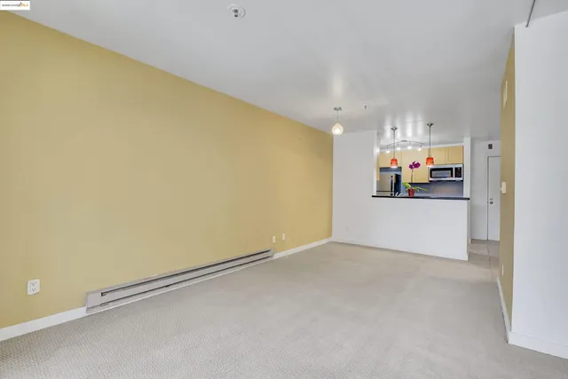 a view of a room with a large window