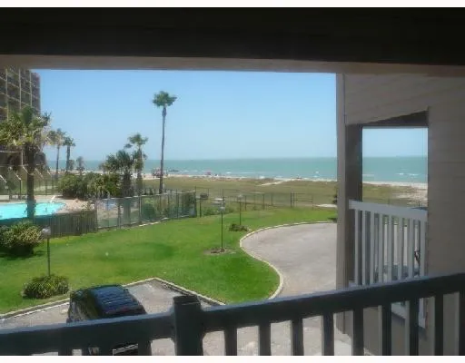 a view of a garden from a balcony