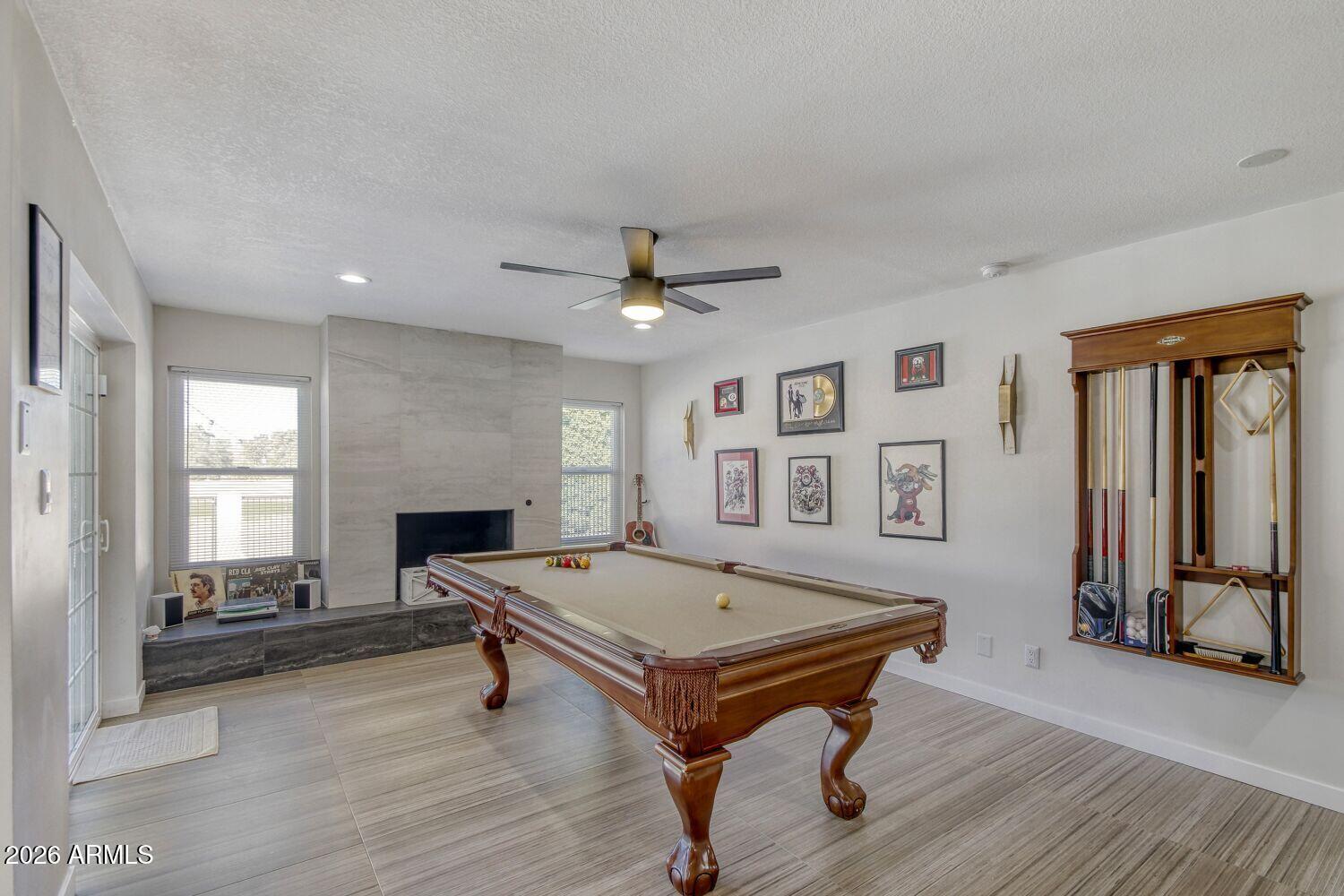 720 West Thunderbird Road Phoenix, AZ 85023 - Photo 13 of 28 a living room with pool table and a couch