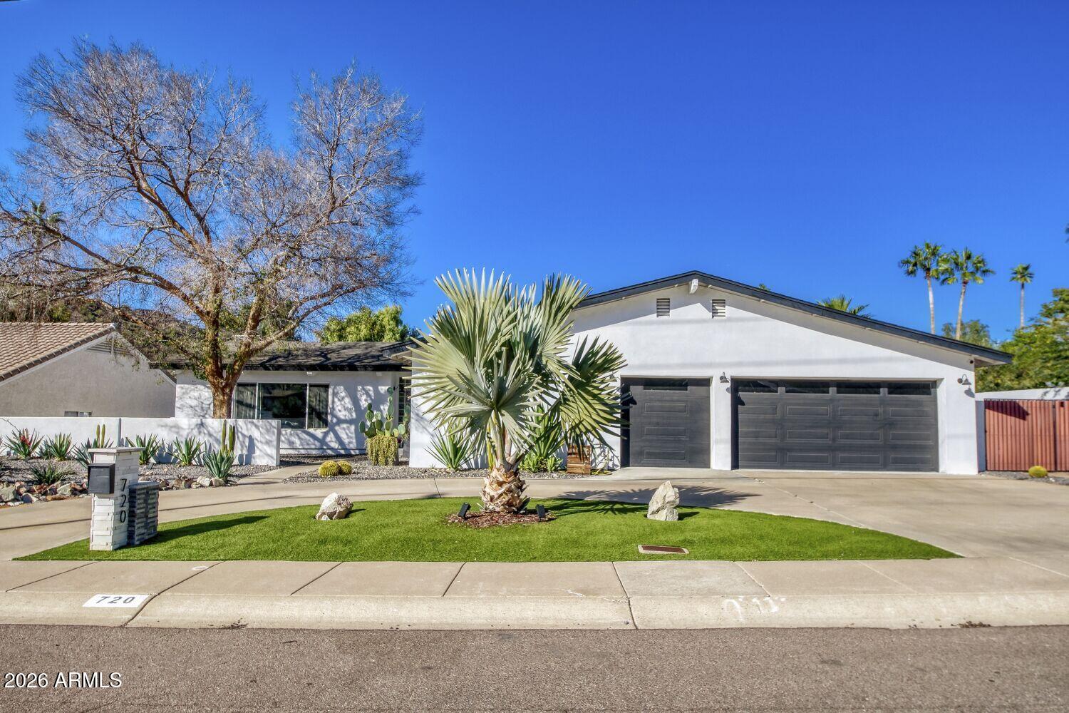720 West Thunderbird Road Phoenix, AZ 85023 - Photo 2 of 28 a front view of a house with a yard