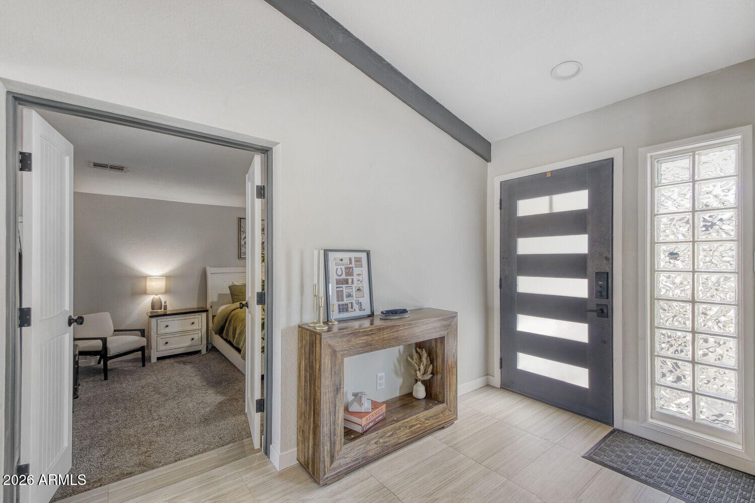 720 West Thunderbird Road Phoenix, AZ 85023 - Photo 4 of 28 a view of a bedroom with furniture and windows