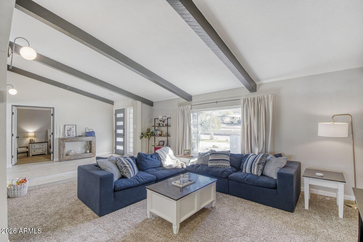720 West Thunderbird Road Phoenix, AZ 85023 - Photo 6 of 28 a living room with furniture and a large window
