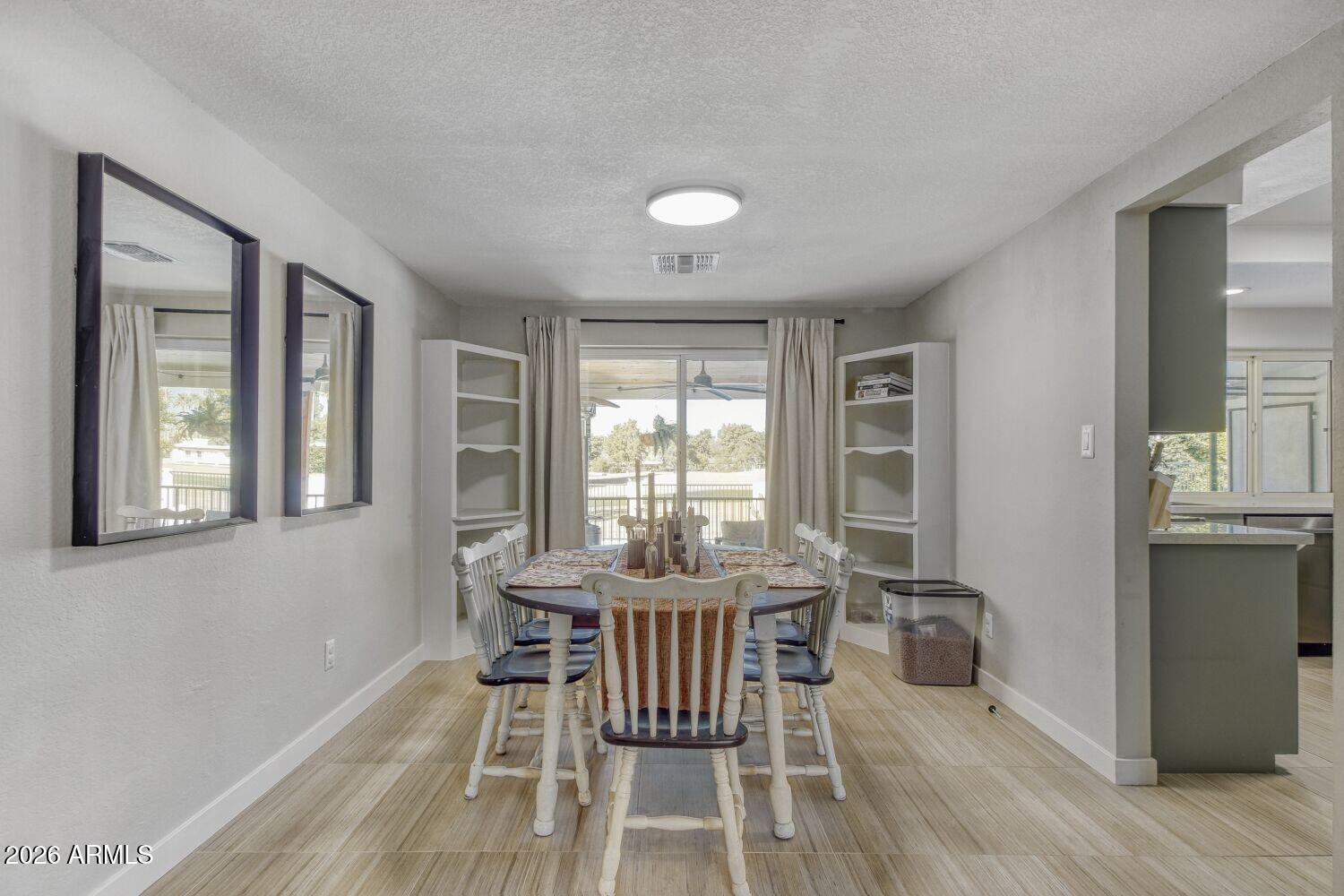 720 West Thunderbird Road Phoenix, AZ 85023 - Photo 8 of 28 a dining room with furniture and window