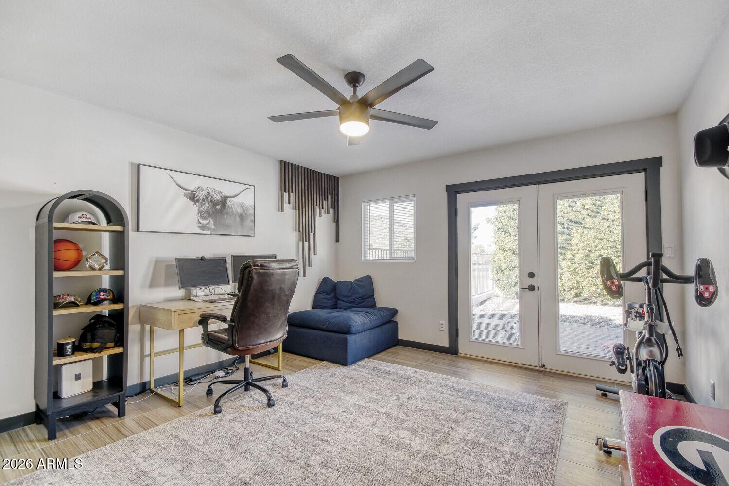 720 West Thunderbird Road Phoenix, AZ 85023 - Photo 9 of 28 a work room with furniture and windows