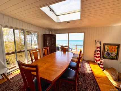 a view of a patio with wooden floor