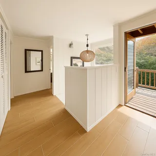 a bedroom with a bed and a mirror