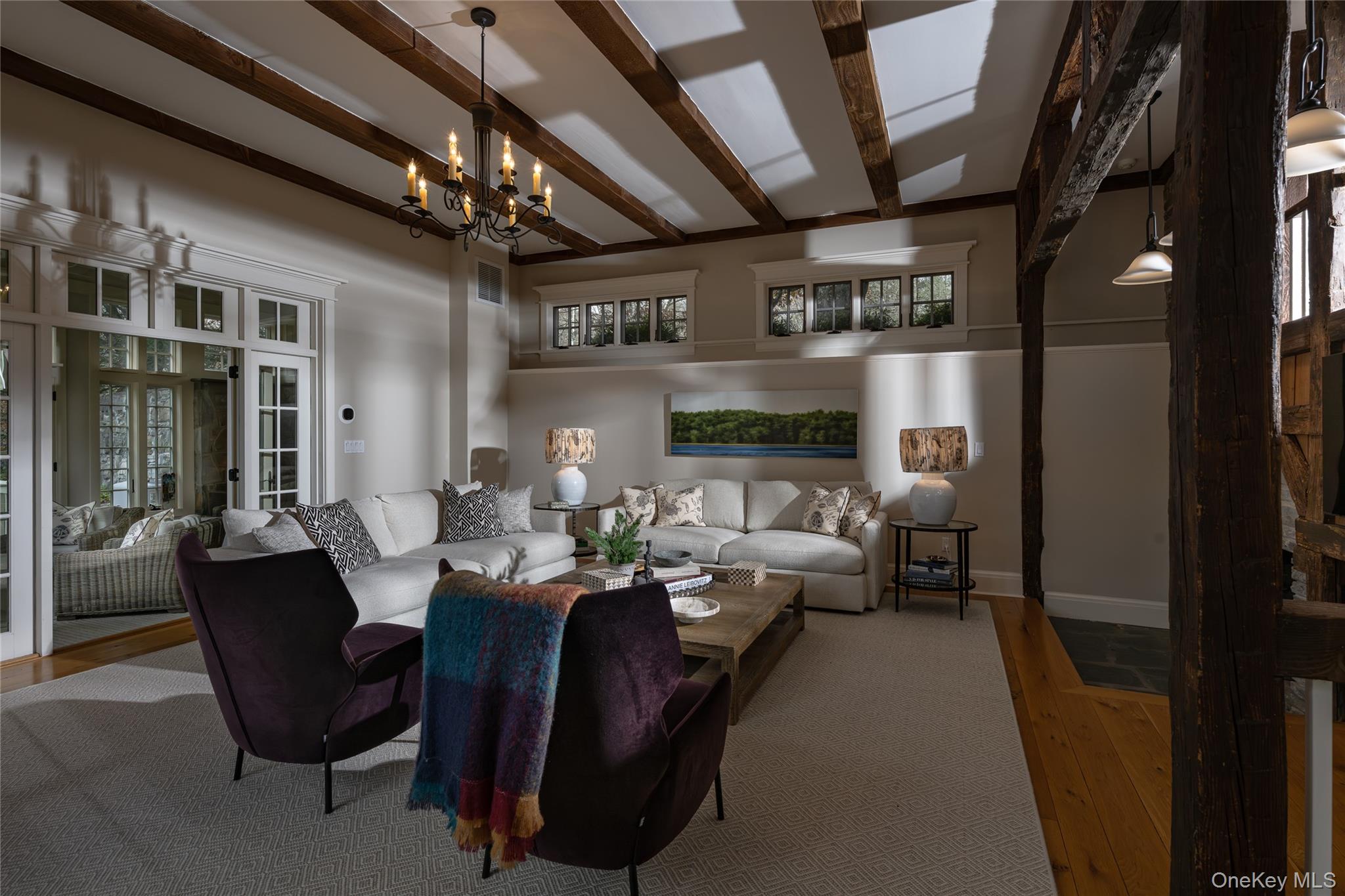 440 Long Ridge Road Pound Ridge, NY 10576 - Photo 11 of 28 a living room with lots of furniture and chandelier