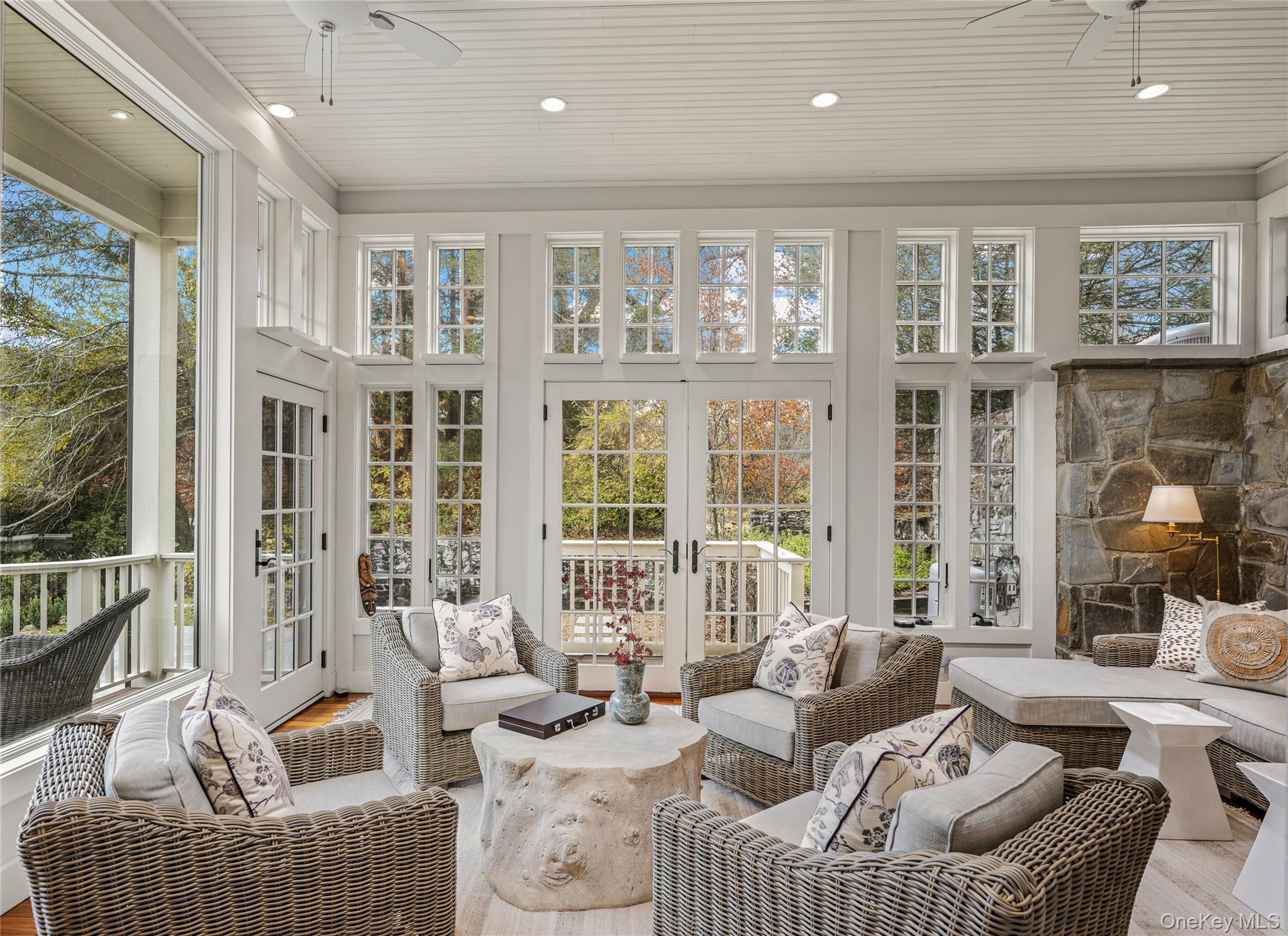 440 Long Ridge Road Pound Ridge, NY 10576 - Photo 12 of 28 a living room with furniture and large windows