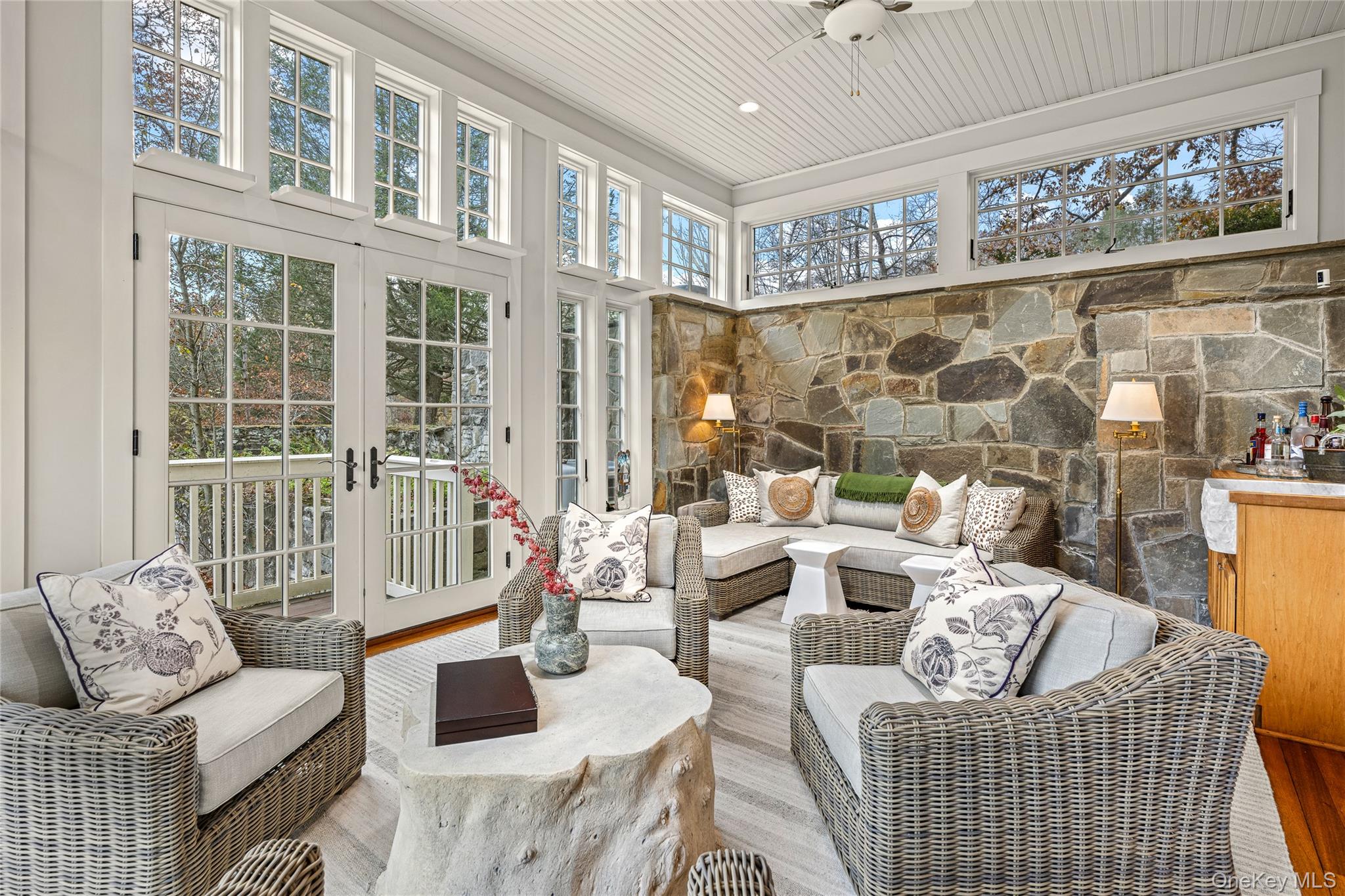 440 Long Ridge Road Pound Ridge, NY 10576 - Photo 13 of 28 a living room with furniture and a floor to ceiling window