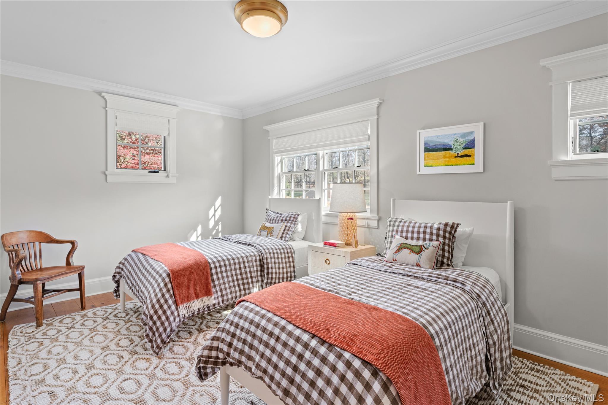 440 Long Ridge Road Pound Ridge, NY 10576 - Photo 17 of 28 a bedroom with two beds and a window