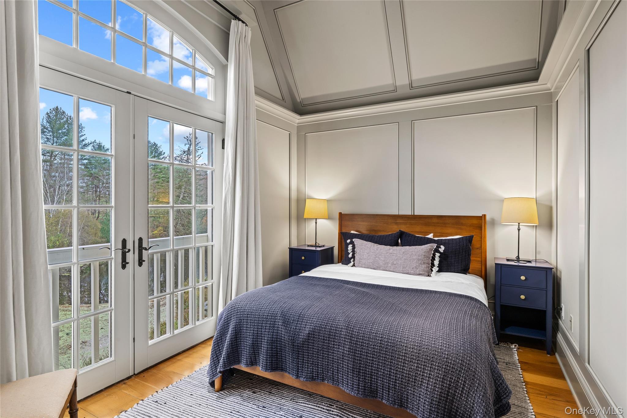 440 Long Ridge Road Pound Ridge, NY 10576 - Photo 18 of 28 a bedroom with a bed and a window