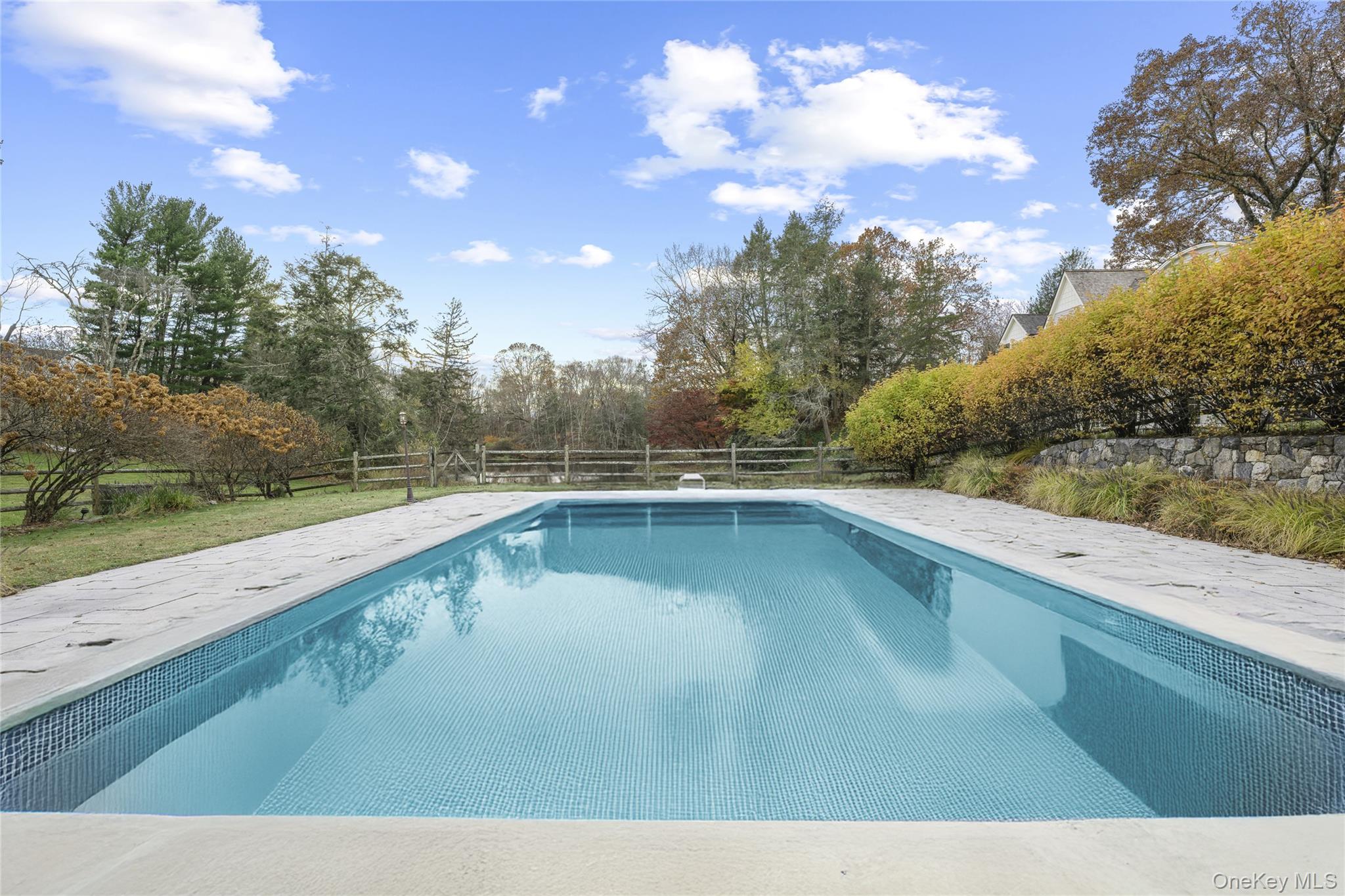 440 Long Ridge Road Pound Ridge, NY 10576 - Photo 22 of 28 a view of a lake from a balcony