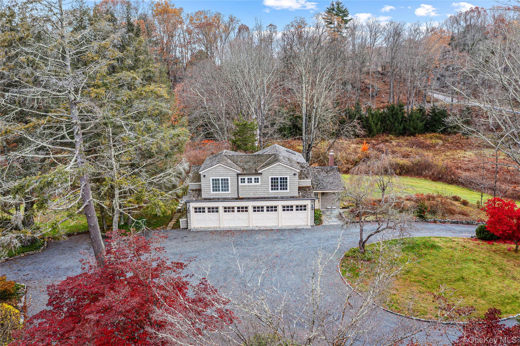 440 Long Ridge Road Pound Ridge, NY 10576 - Photo 24 of 28 a view of a house with a yard