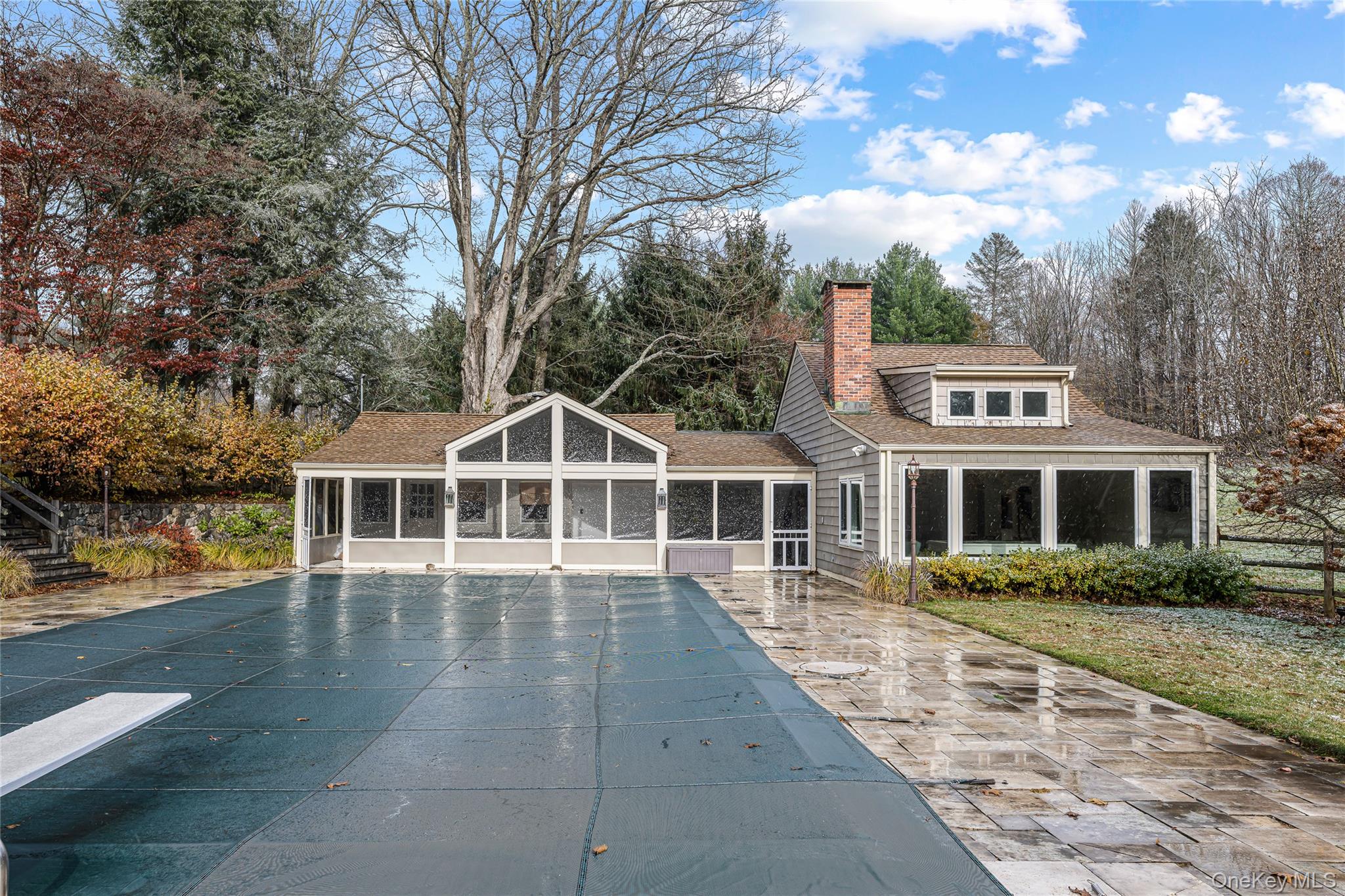 440 Long Ridge Road Pound Ridge, NY 10576 - Photo 25 of 28 a front view of a house with a garden