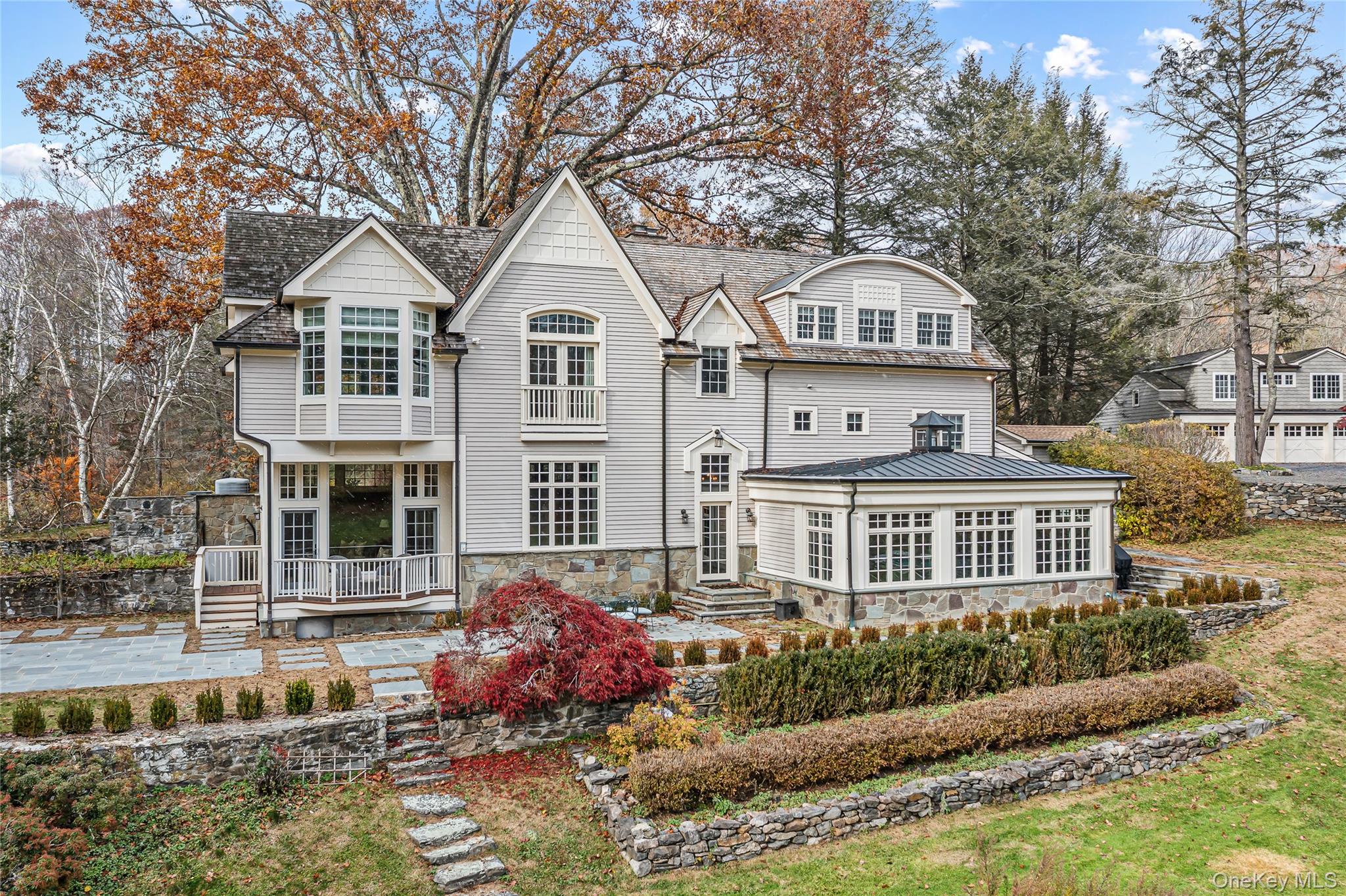 440 Long Ridge Road Pound Ridge, NY 10576 - Photo 27 of 28 a front view of a house with a yard and potted plants
