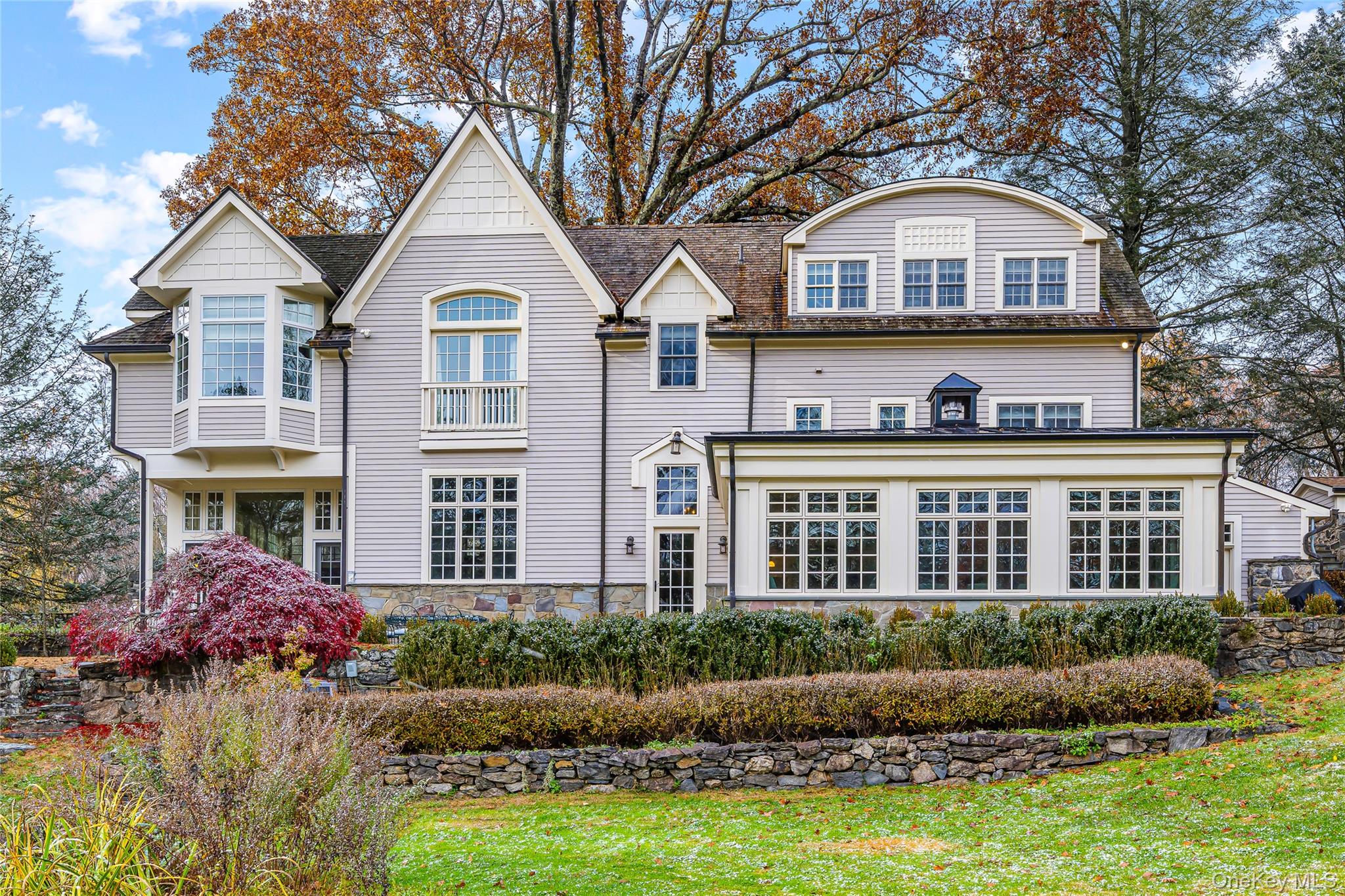 440 Long Ridge Road Pound Ridge, NY 10576 - Photo 4 of 28 a front view of a house with a yard and garage