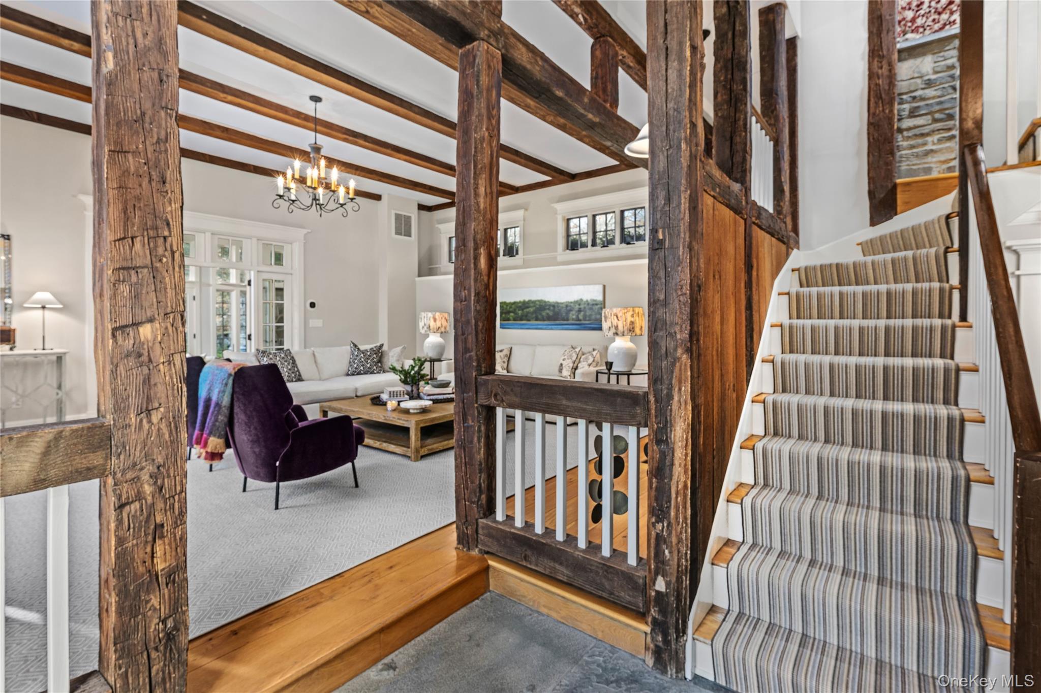 440 Long Ridge Road Pound Ridge, NY 10576 - Photo 8 of 28 a view of balcony with couch and wooden floor