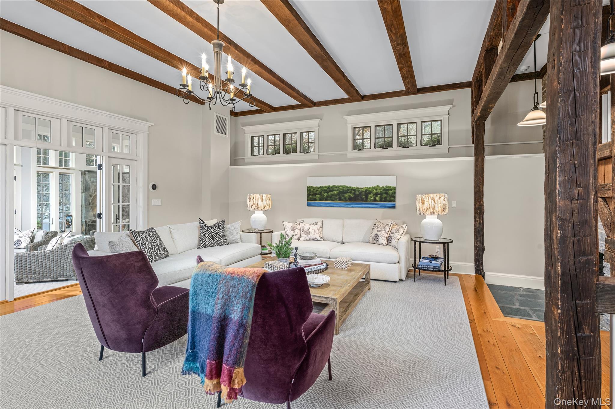 440 Long Ridge Road Pound Ridge, NY 10576 - Photo 9 of 28 a living room with furniture and a chandelier