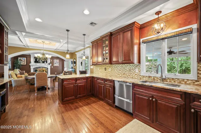 a bathroom with a sink toilet and a mirror