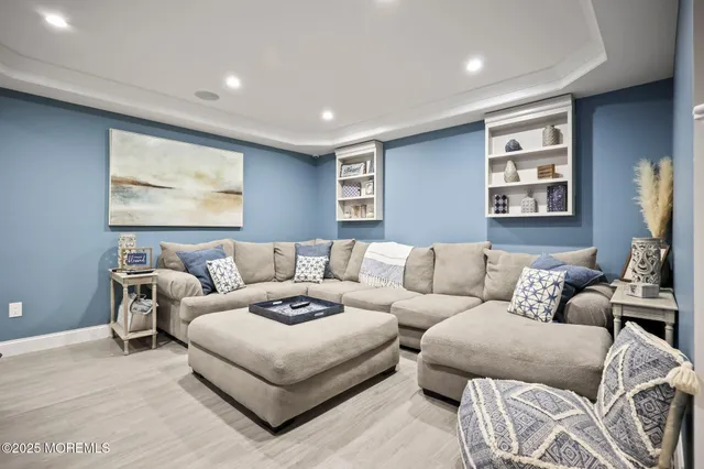 a workspace with furniture window and wooden floor