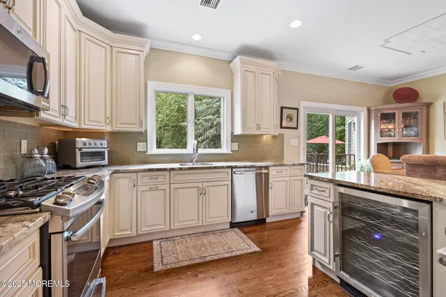 a dining room with furniture and a fireplace