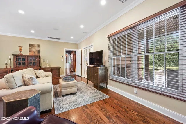 a view of a park with trees in the background