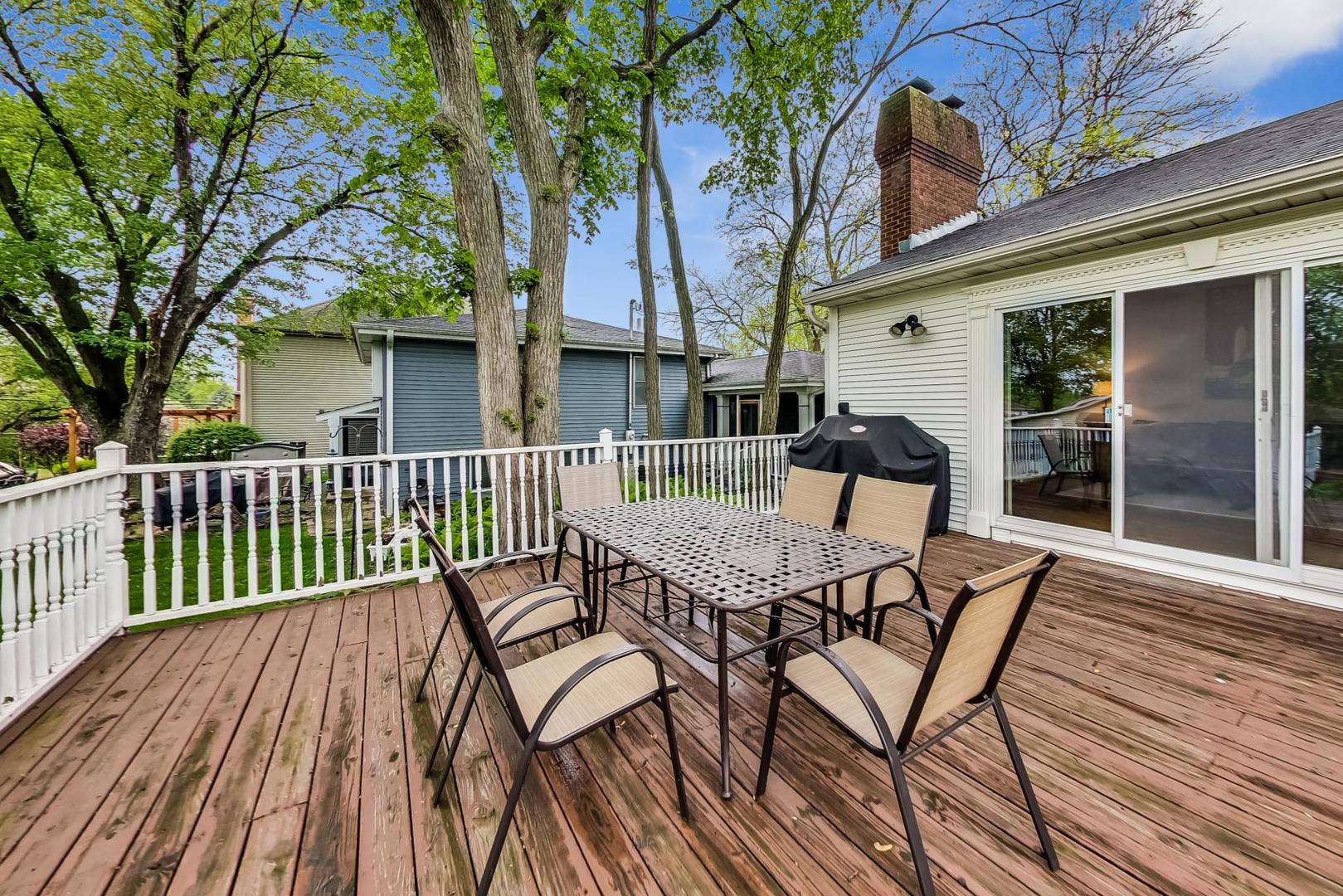 482 West 3rd Street Elmhurst, IL 60126 - Photo 28 of 39 a view of a chair and table on the wooden floor