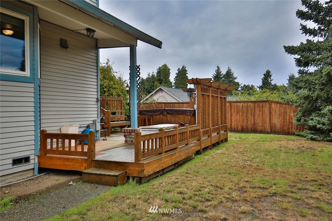 2706 Northeast 5th Court Renton, WA 98056 - Photo 22 of 24 a view of a deck with a yard