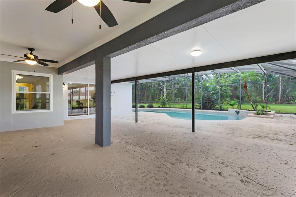 15038 Willow Lane Tavares, FL 32778 - Photo 26 of 37 a view of empty room with floor to ceiling window