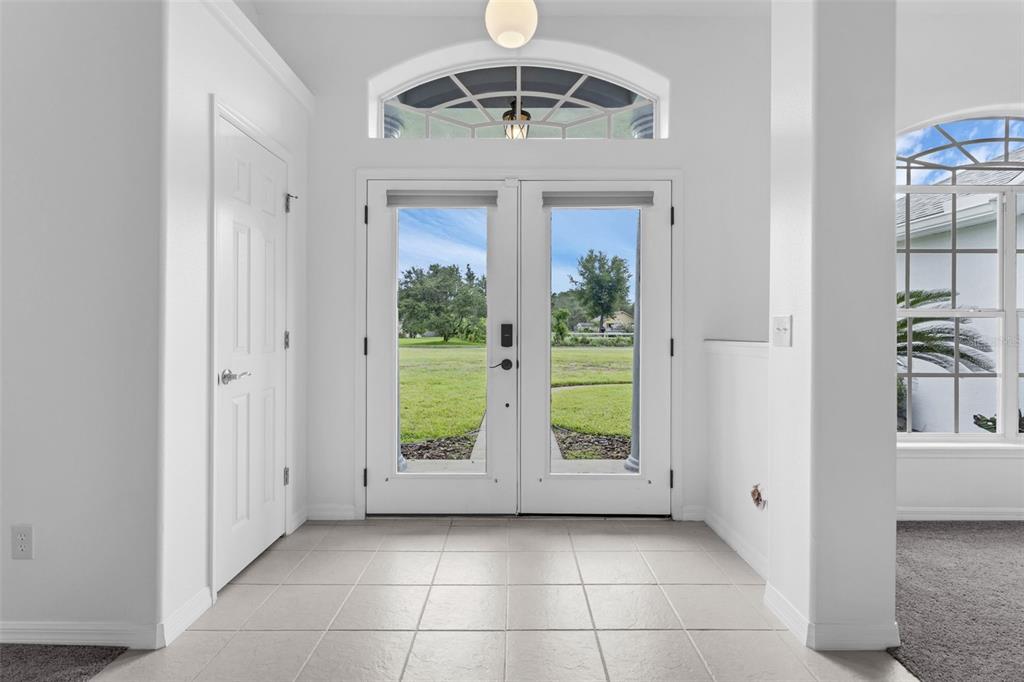 15038 Willow Lane Tavares, FL 32778 - Photo 3 of 37 a view of entryway with front door