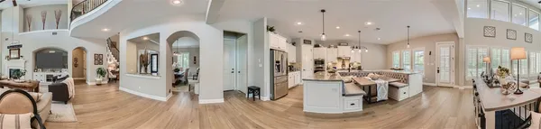 a view of a living room and dining room