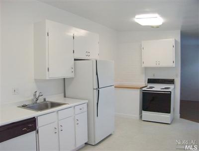 2070 Fifth Avenue San Rafael, CA 94901 - Photo 3 of 6 a kitchen with stainless steel appliances a sink stove and cabinets
