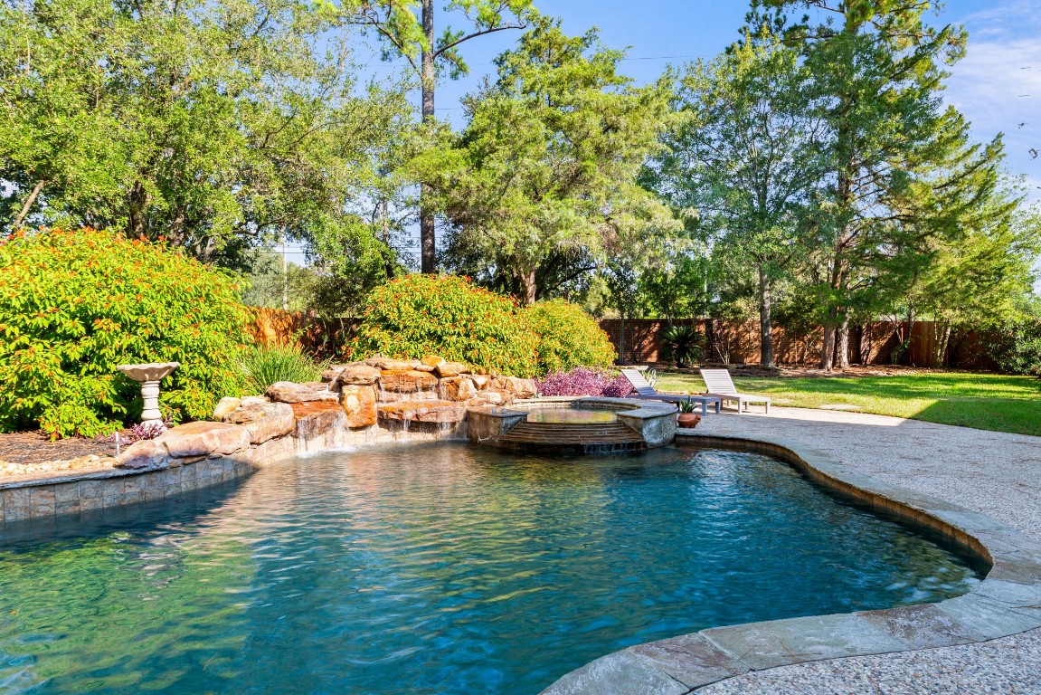 13915 Springmint Drive Cypress, TX 77429 - Photo 34 of 43 a view of swimming pool with lawn chairs and plants