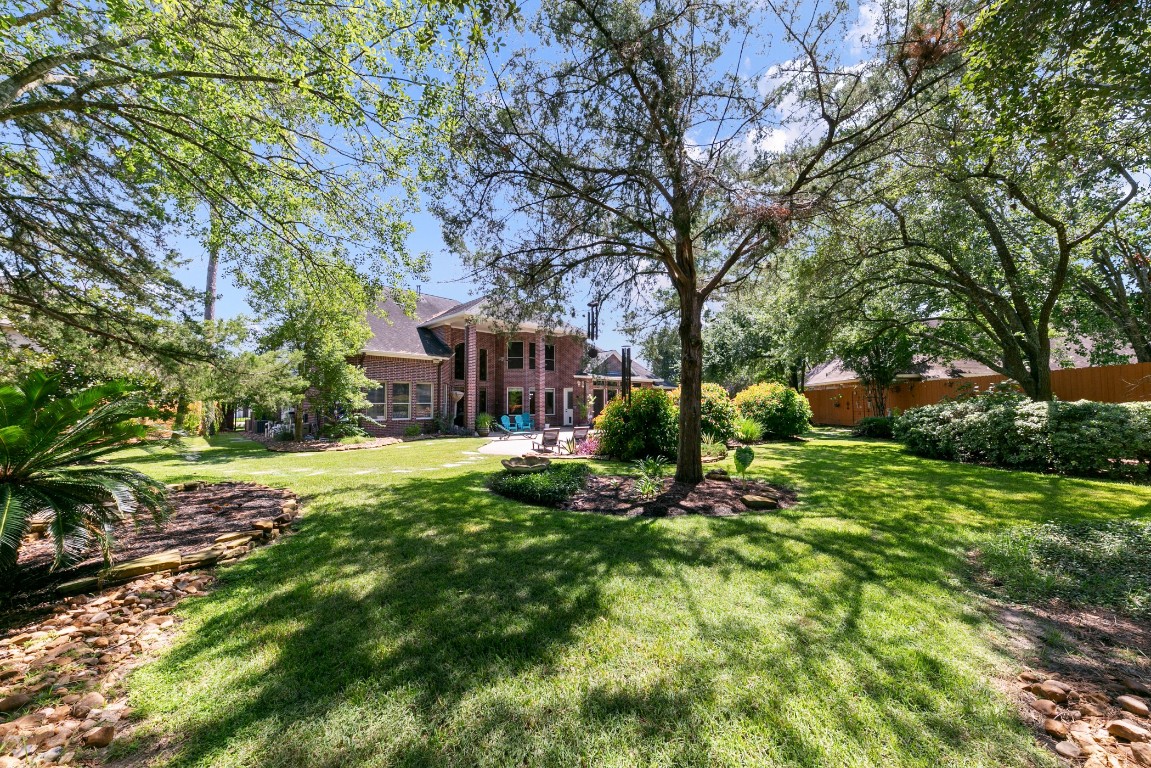 13915 Springmint Drive Cypress, TX 77429 - Photo 39 of 43 a view of a house with a yard and tree s
