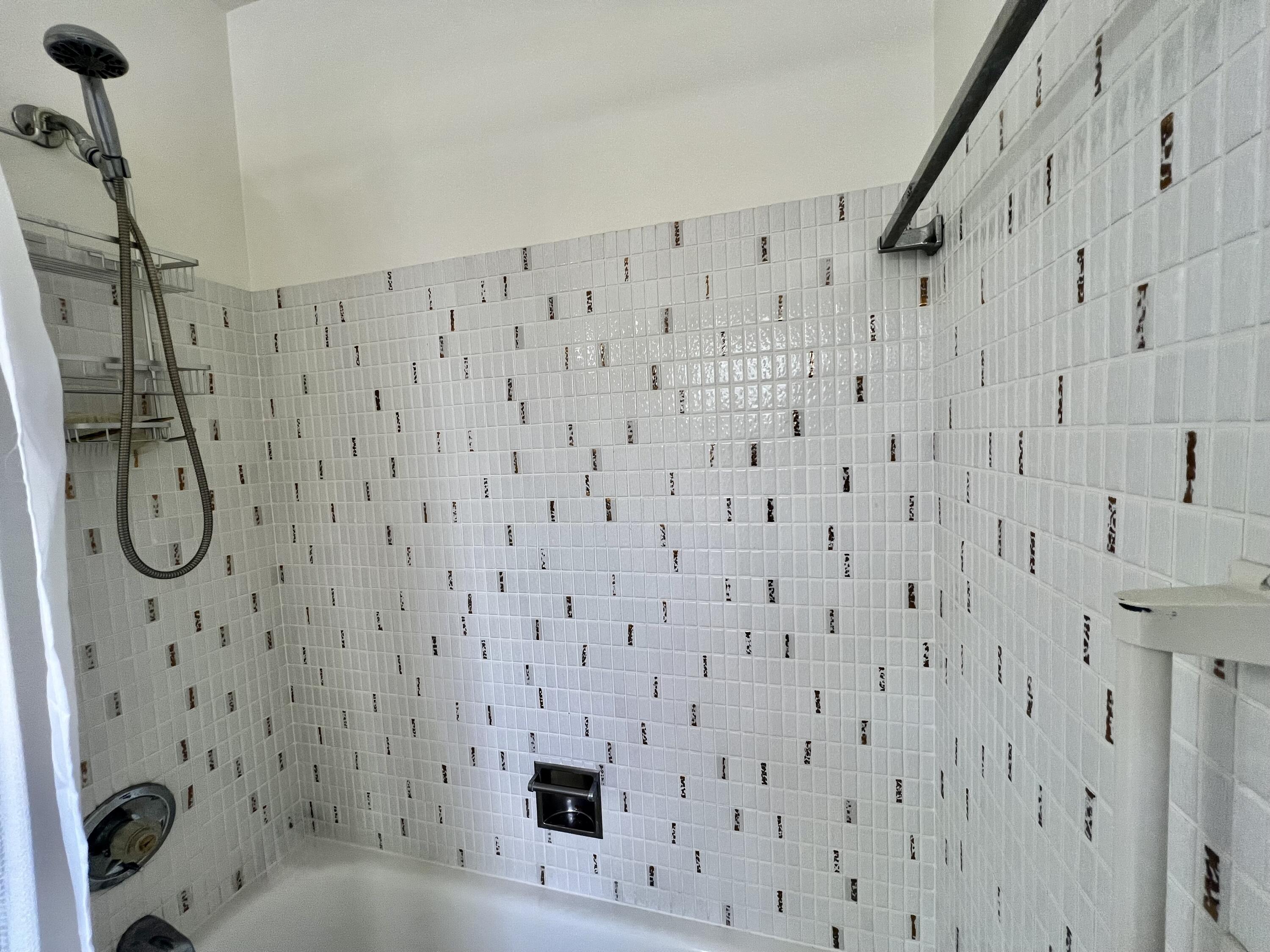 5640 Southwest 3rd Place, Unit 217 Margate, FL 33068 - Photo 11 of 32 a bathroom with a bathtub and shower