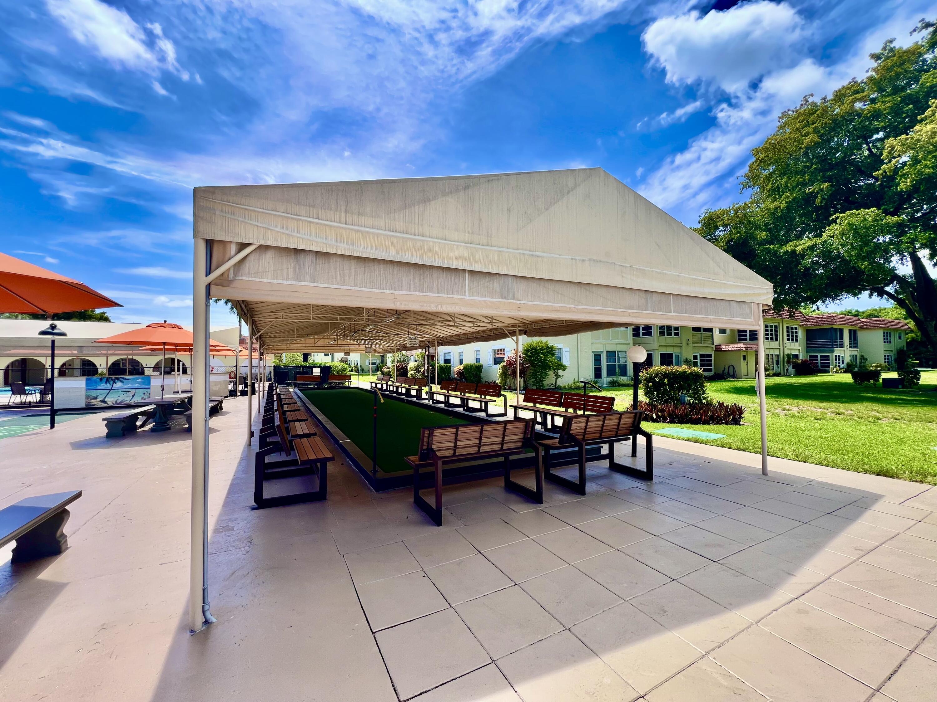 5640 Southwest 3rd Place, Unit 217 Margate, FL 33068 - Photo 27 of 32 a view of outdoor space with seating