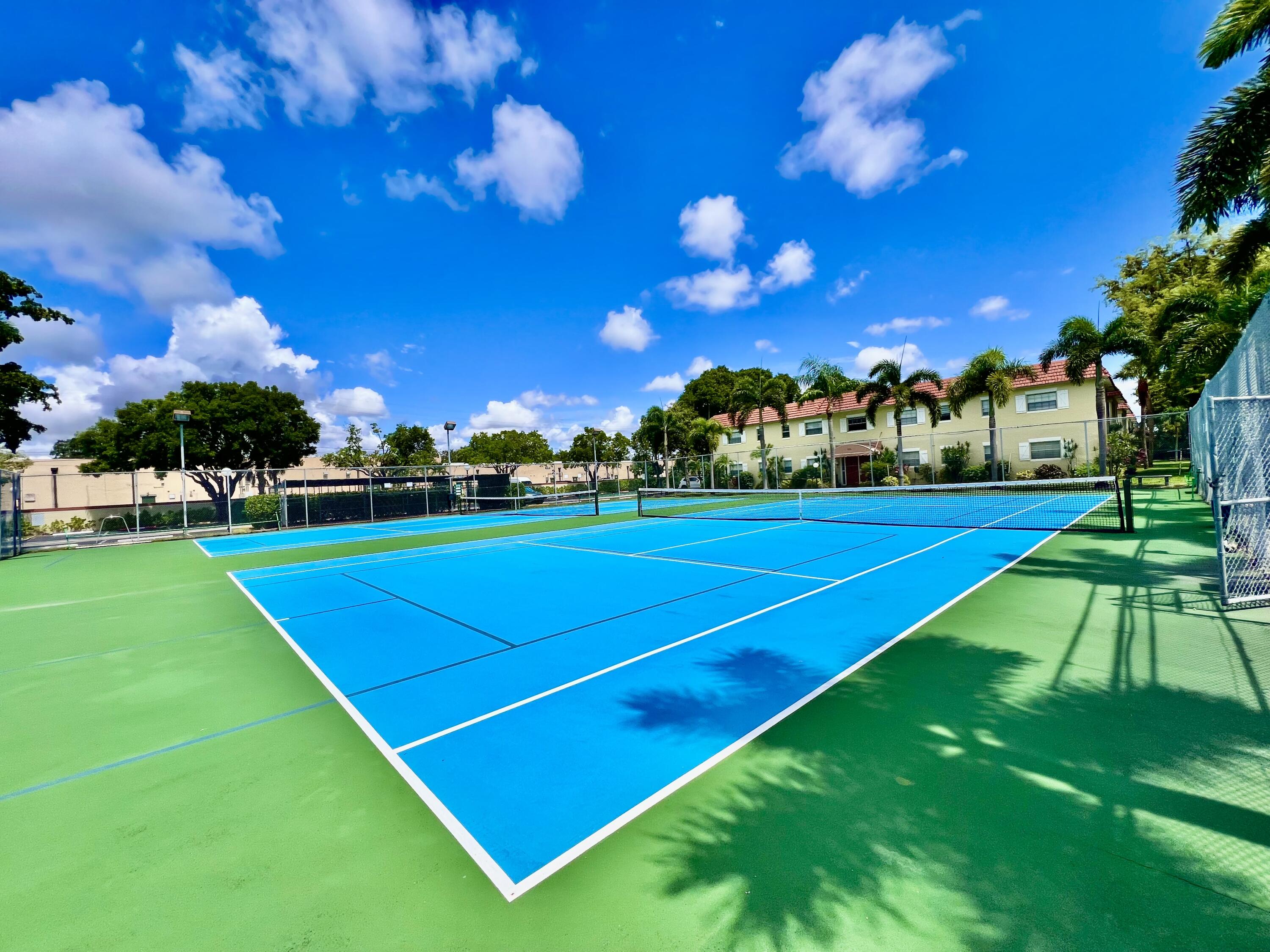 5640 Southwest 3rd Place, Unit 217 Margate, FL 33068 - Photo 29 of 32 a view of an outdoor space and basketball court