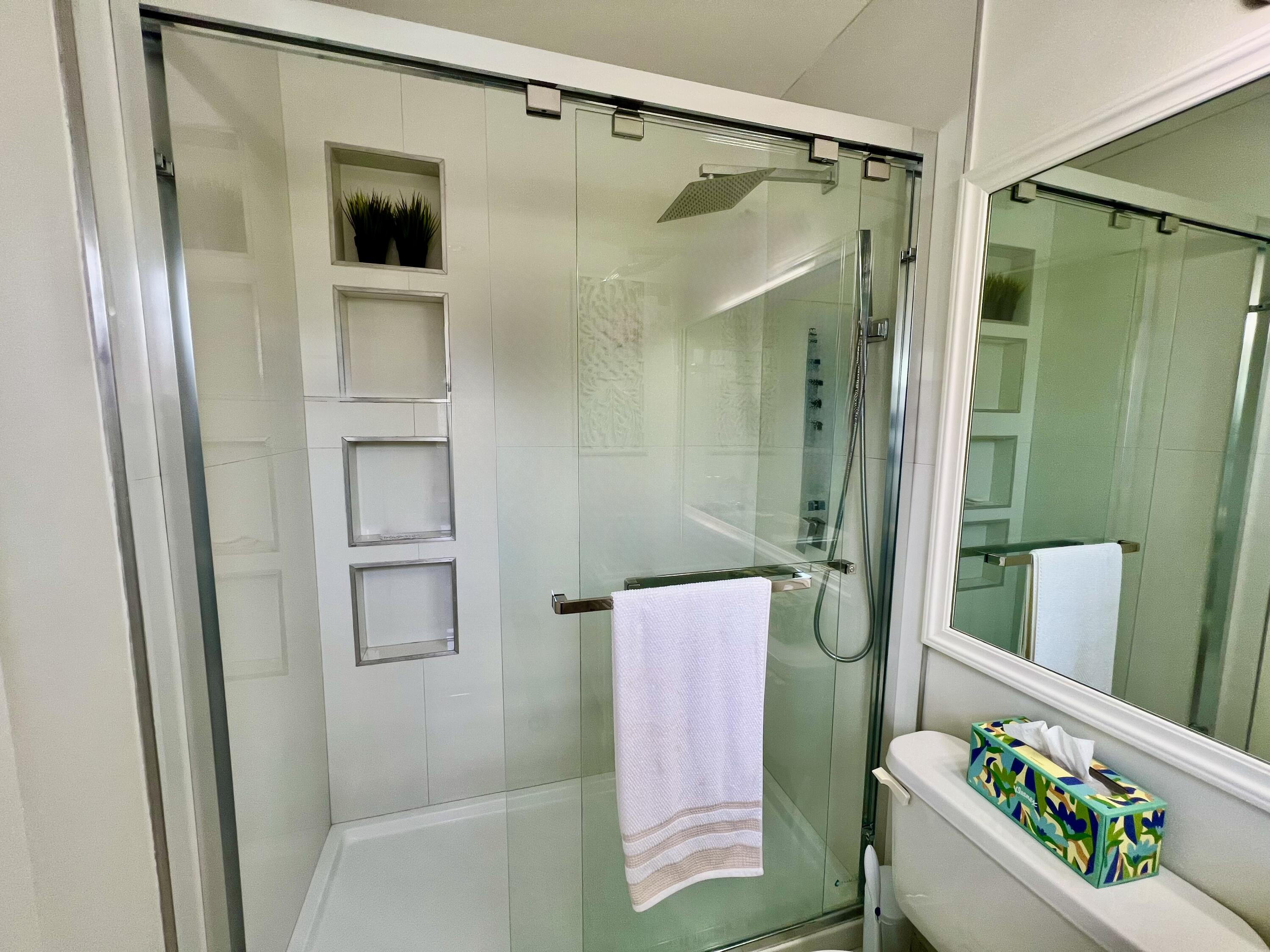 5640 Southwest 3rd Place, Unit 217 Margate, FL 33068 - Photo 7 of 32 a bathroom with a shower curtain and a sink