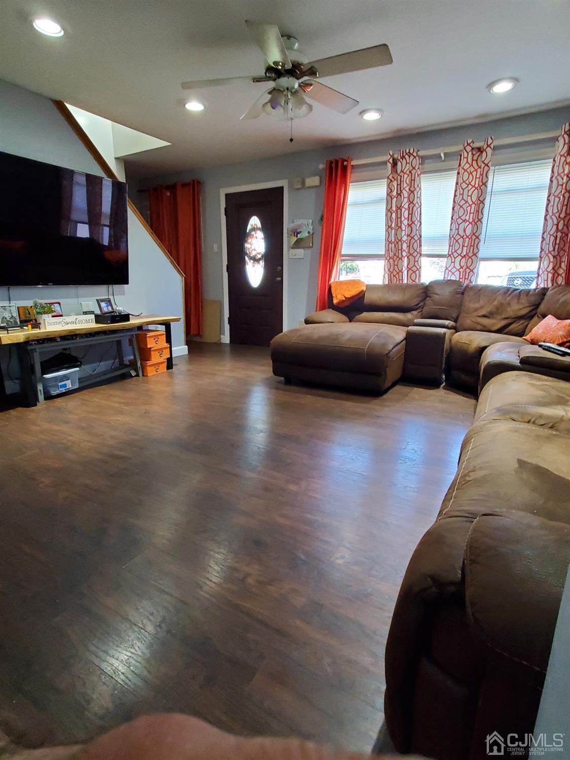 1 Altamont Road Edison, NJ 08817 - Photo 3 of 14 a living room with furniture and a flat screen tv