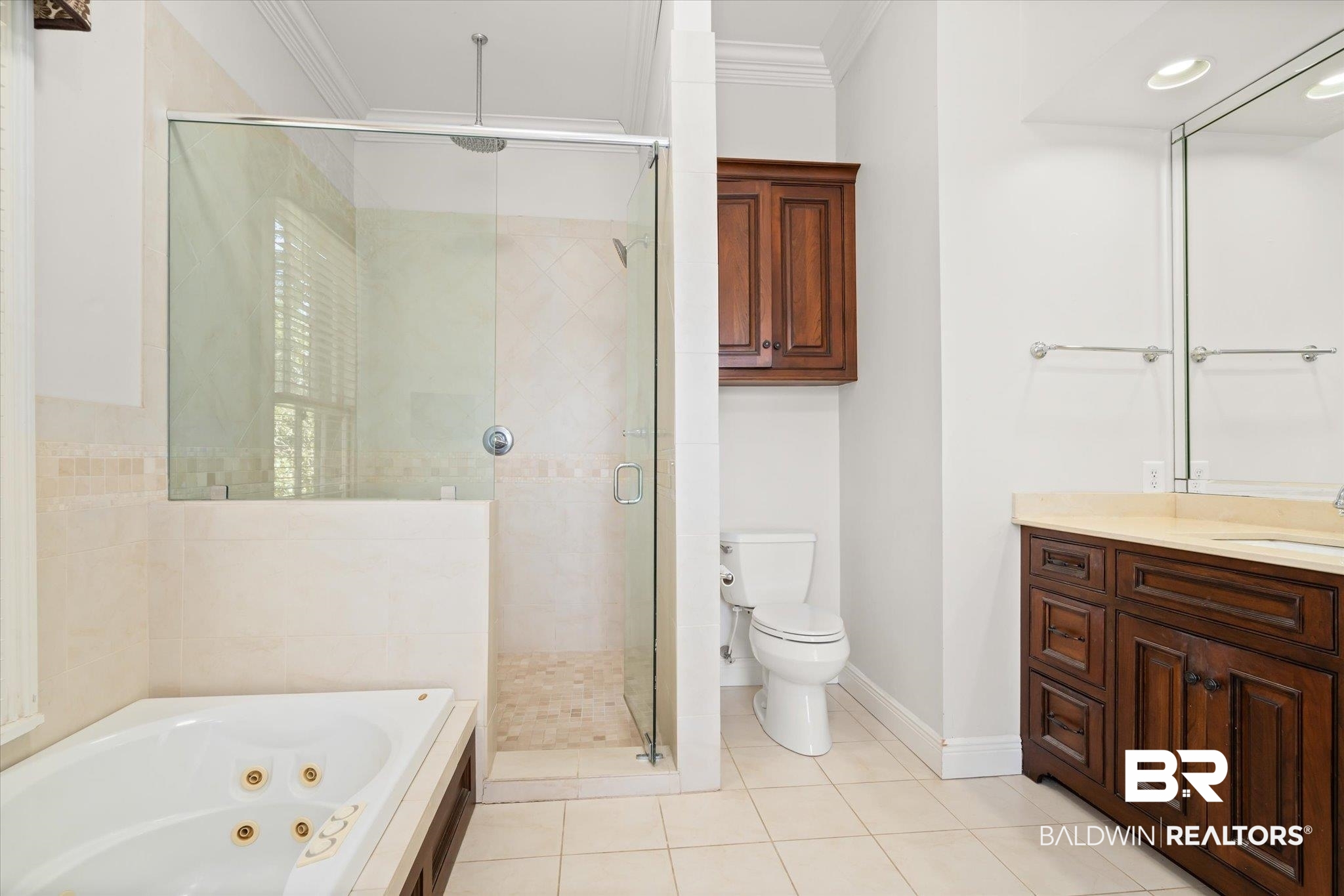 950 Palmetto Street Mobile, AL 36604 - Photo 14 of 33 Full bathroom with ornamental molding, separate shower and tub, vanity, toilet, and tile patterned floors